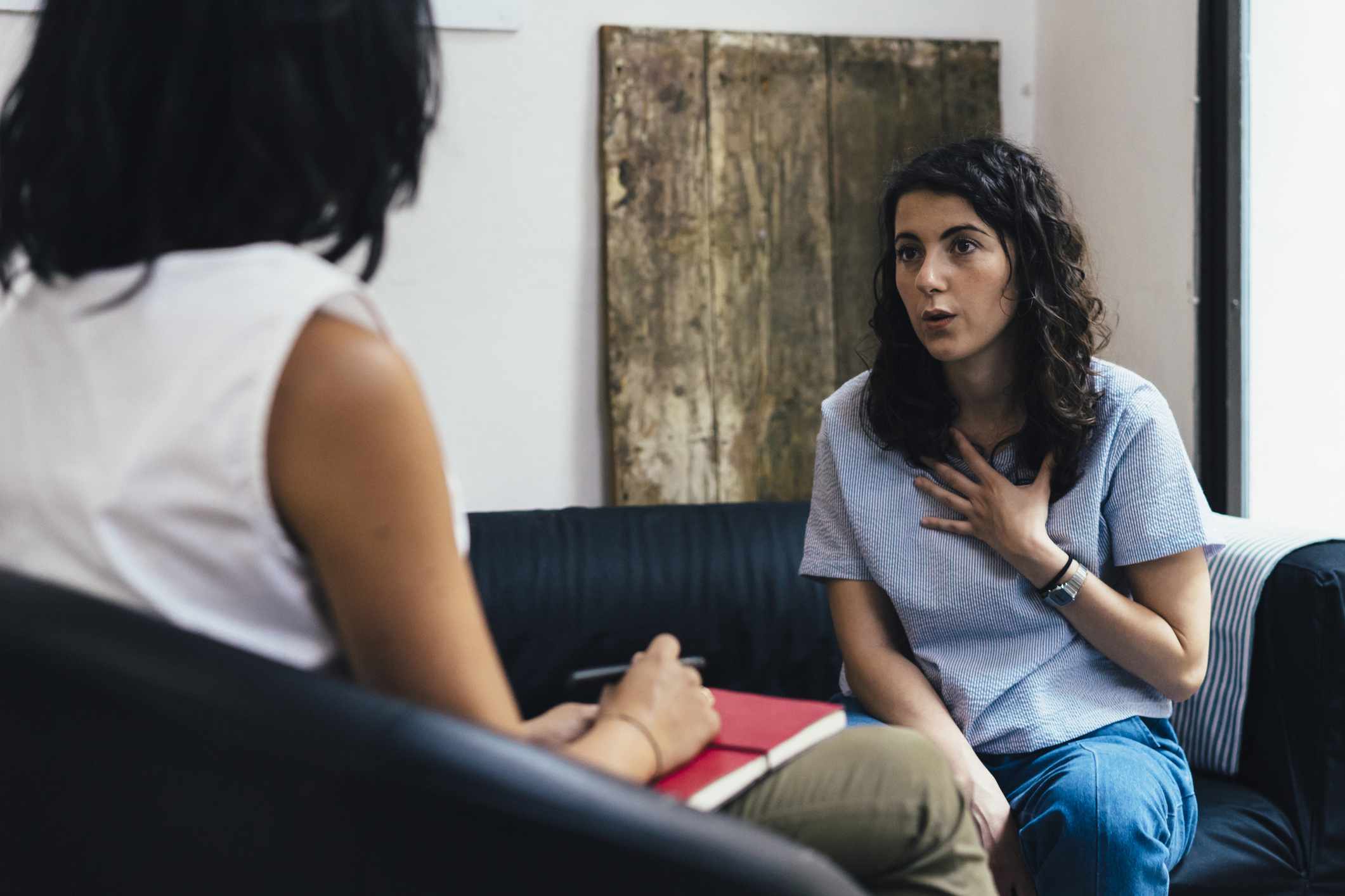 Therapy session between psychologist and client
